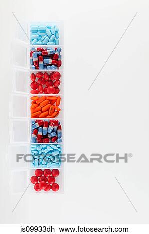 Pills in an organiser View Large Photo Image Stock Image - Pills in an organiser. Fotosearch
