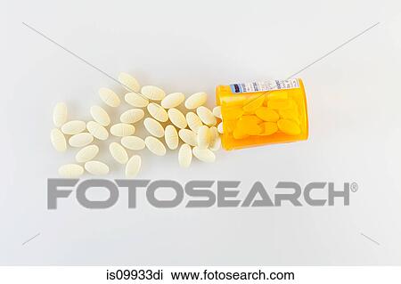 Pills spilling from container View Large Photo Image Stock Image - Pills spilling from container. Fotosearch