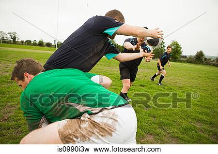 Rugby game in action View Large Photo Image Stock Photo - Rugby game in action. Fotosearch