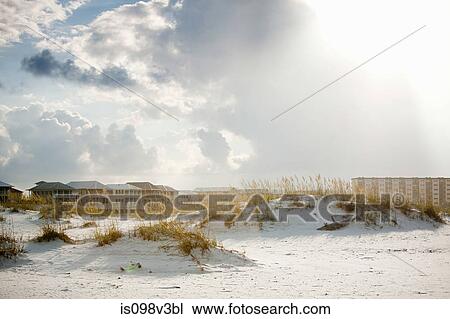Sand dunes and apartments View Large Photo Image Stock Image - Sand dunes and apartments. Fotosearch