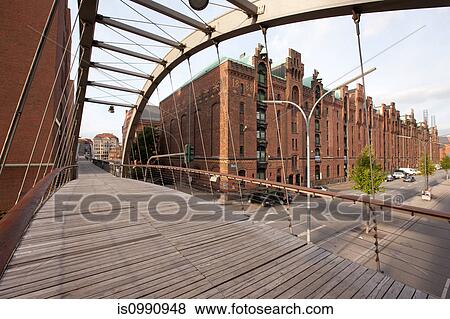 Speicherstadt, footbridge and historic warehouses, Hamburg, Germany View Large Photo Image Stock Photo - Speicherstadt, footbridge and historic warehouses, Hamburg, Germany. Fotosearch