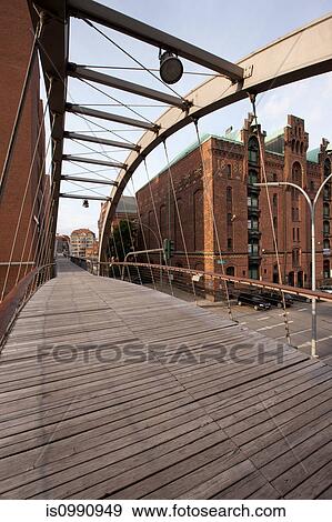 Speicherstadt, footbridge and historic warehouses, Hamburg, Germany View Large Photo Image Stock Photo - Speicherstadt, footbridge and historic warehouses, Hamburg, Germany. Fotosearch
