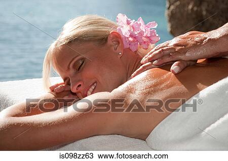 Woman having a massage View Large Photo Image Stock Image - Woman having a massage. Fotosearch