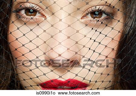 Woman with netting covering face View Large Photo Image Picture - Woman with netting covering face. Fotosearch