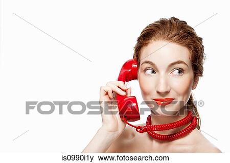 Stock Photo - Woman with red telephone cord wrapped around neck. Fotosearch