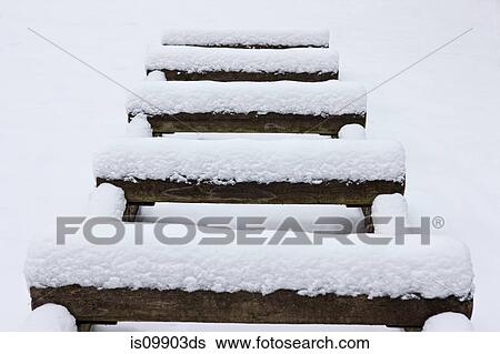 Wooden logs covered in snow View Large Photo Image Stock Photograph - Wooden logs covered in snow. Fotosearch