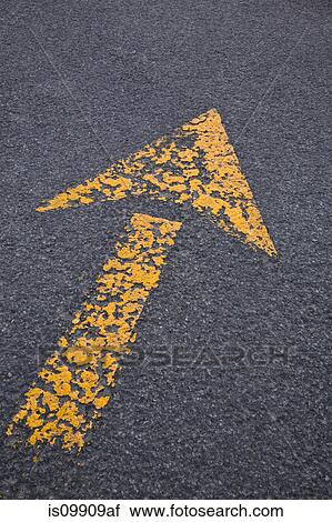 Yellow arrow on asphalt View Large Photo Image Stock Image - Yellow arrow on asphalt. Fotosearch