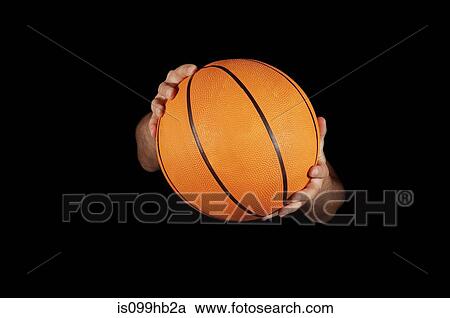 Close up of basket ball being held View Large Photo Image Stock Image - Close up of basket ball being held. Fotosearch