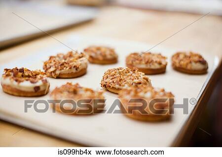 Stock Photo - Close up of freshly baked cakes. Fotosearch