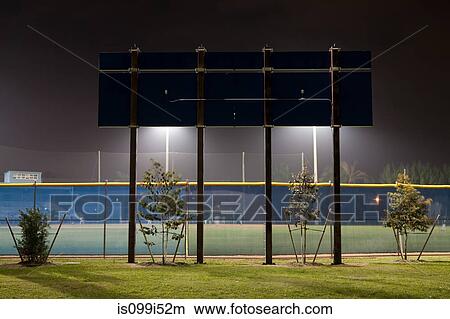 Stadium scoreboard illuminated sportsground at night View Large Photo Image Picture - Stadium scoreboard illuminated sportsground at night. Fotosearch