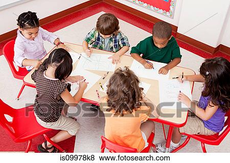 Children drawing at school View Large Photo Image Stock Photo - Children drawing at school. Fotosearch