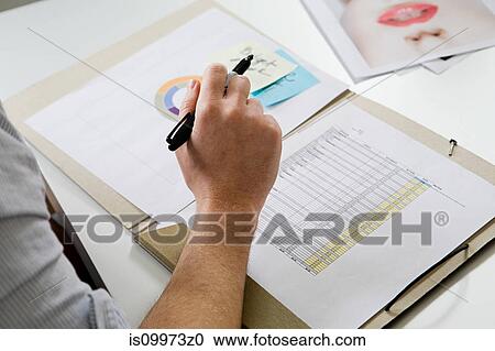Fashion designer working at desk View Large Photo Image Stock Image - Fashion designer working at desk. Fotosearch