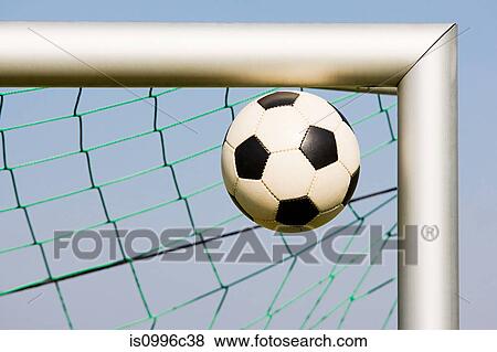 Stock Photo - Football in corner of goalpost. Fotosearch