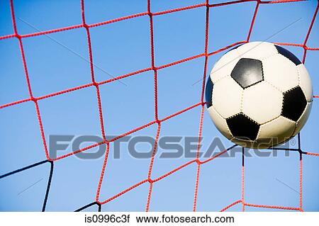 Stock Image - Football in goal. Fotosearch