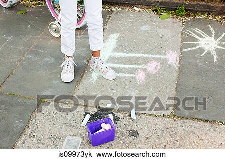 Girl standing by chalk drawing on sidewalk View Large Photo Image Stock Image - Girl standing by chalk drawing on sidewalk. Fotosearch