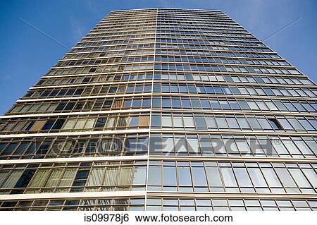 Stock Photograph - Glass skyscrapers against blue sky. Fotosearch