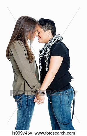 Lesbian couple against white background View Large Photo Image Stock Photo - Lesbian couple against white background. Fotosearch