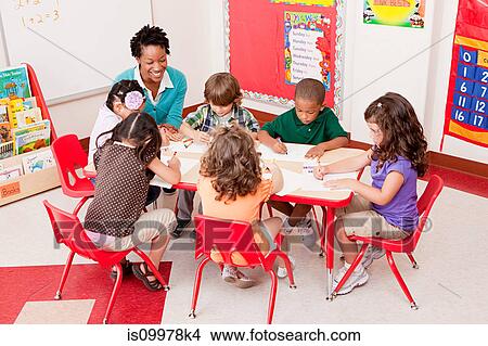 Teacher and children in school art class View Large Photo Image Picture - Teacher and children in school art class. Fotosearch
