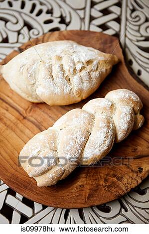 Two loaves of home baked bread View Large Photo Image Stock Photograph - Two loaves of home baked bread. Fotosearch
