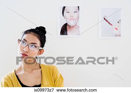 Young female fashion designer, portrait View Large Photo Image Stock Photo - Young female fashion designer, portrait. Fotosearch
