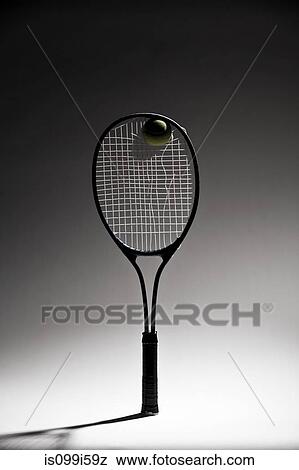 Stock Photo - Ball in tennis racket. Fotosearch