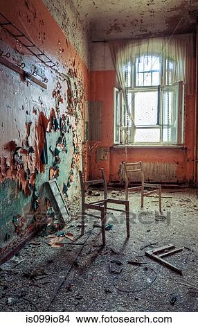 Broken chairs in decayed interior of Sanatorium Teupitz, Brandenburg, Germany View Large Photo Image Picture - Broken chairs in decayed interior of Sanatorium Teupitz, Brandenburg, Germany. Fotosearch