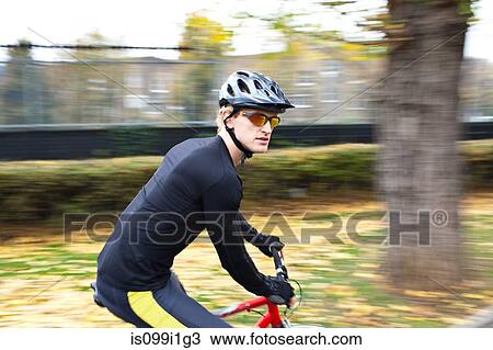 Stock Image - Cyclist on the move. Fotosearch