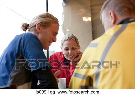 Cyclists meeting in cafe View Large Photo Image Stock Image - Cyclists meeting in cafe. Fotosearch