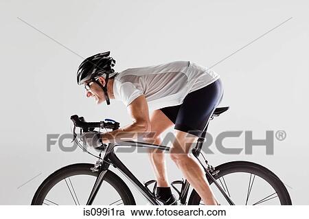 Determined male cyclist View Large Photo Image Stock Image - Determined male cyclist. Fotosearch