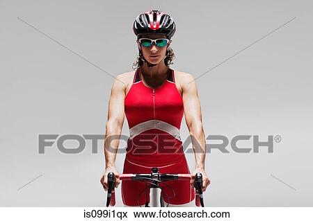 Female cyclist View Large Photo Image Stock Photo - Female cyclist. Fotosearch
