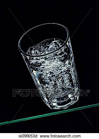 Stock Image - Glass of sparkling water. Fotosearch