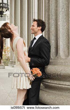 Stock Photograph - Happy newlywed couple. Fotosearch