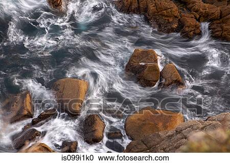 High angle view of rocks in sea View Large Photo Image Stock Image - High angle view of rocks in sea. Fotosearch