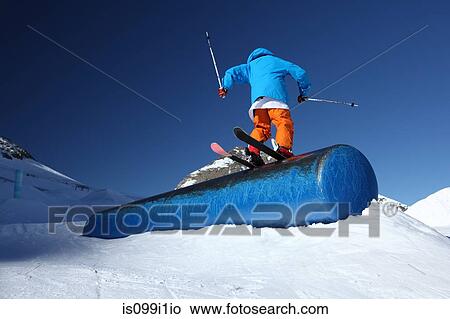 Male skier balancing on ski slope View Large Photo Image Picture - Male skier balancing on ski slope. Fotosearch
