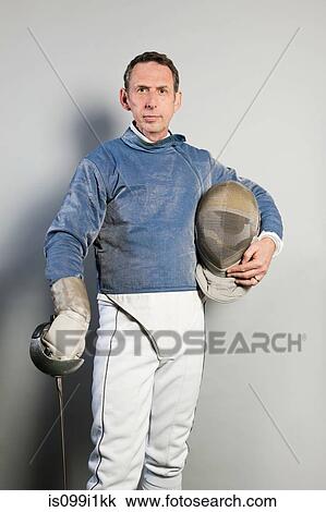 Mature male fencer, portrait View Large Photo Image Stock Image - Mature male fencer, portrait. Fotosearch