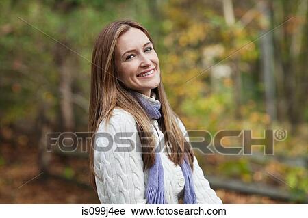 Stock Image - Mature woman outdoors. Fotosearch