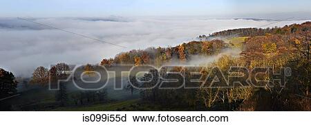 Morning mist over landscape View Large Photo Image Stock Image - Morning mist over landscape. Fotosearch