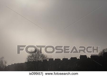 Overcast sky above terraced houses View Large Photo Image Stock Image - Overcast sky above terraced houses. Fotosearch