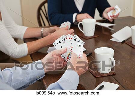 People playing cards View Large Photo Image Picture - People playing cards. Fotosearch