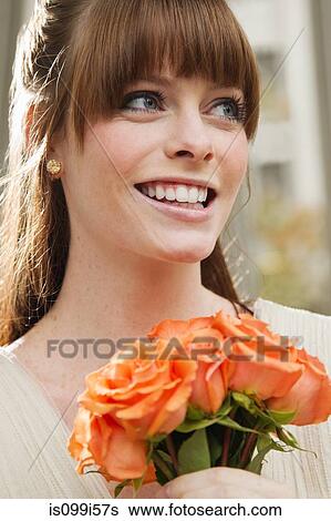 Potrait of a bride with roses View Large Photo Image Stock Photograph - Potrait of a bride with roses. Fotosearch