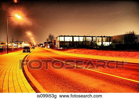 Road in glow of street lights View Large Photo Image Stock Image - Road in glow of street lights. Fotosearch