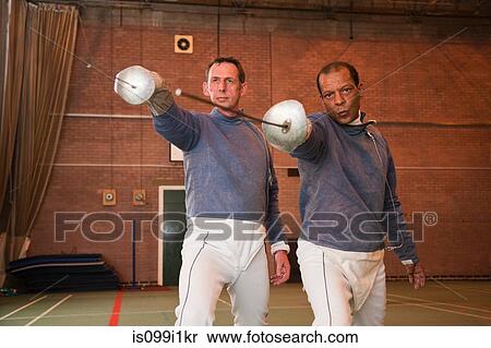 Senior and mature men holding fencing foils View Large Photo Image Stock Photography - Senior and mature men holding fencing foils. Fotosearch
