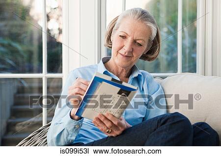 Senior woman doing sudoku puzzles View Large Photo Image Stock Image - Senior woman doing sudoku puzzles. Fotosearch