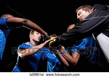 Soccer team planning game in huddle View Large Photo Image Stock Image - Soccer team planning game in huddle. Fotosearch