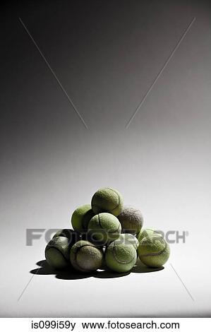 Stack of tennis balls View Large Photo Image Stock Photo - Stack of tennis balls. Fotosearch