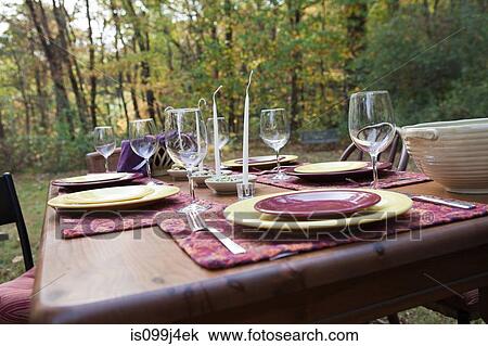 Table set for outdoors dinner View Large Photo Image Stock Image - Table set for outdoors dinner. Fotosearch