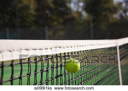 Tennis ball hitting net View Large Photo Image Stock Photograph - Tennis ball hitting net. Fotosearch