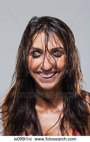 Stock Image - Woman looking euphoric. Fotosearch