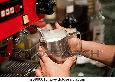 Barista making coffee in cafe View Large Photo Image Stock Photo - Barista making coffee in cafe. Fotosearch