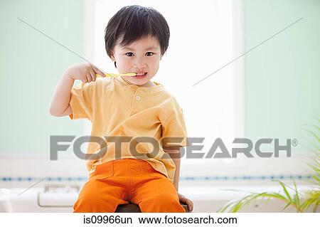 Boy brushing teeth View Large Photo Image Picture - Boy brushing teeth. Fotosearch